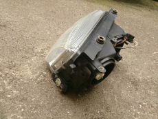 Hella Scheinwerfer 148691-00 H4/H7 vl für VW Passat B5