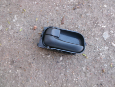Türöffner links 806712F002 für Nissan Primera P11