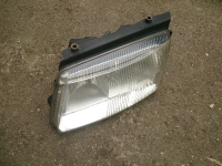 Hella Scheinwerfer 148691-00 H4/H7 vl für VW Passat B5