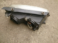 Hella Scheinwerfer 148691-00 H4/H7 vl für VW Passat B5